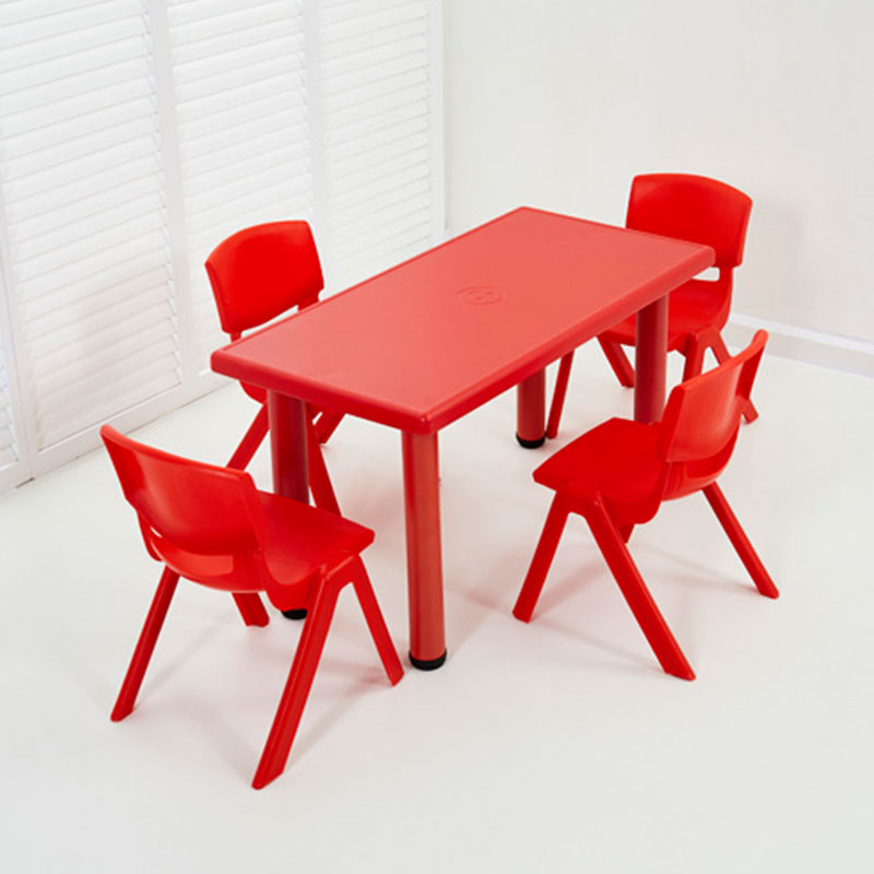 Plastic Six-person Rectangular Table With A Smiley Face In The Middle Of The Table